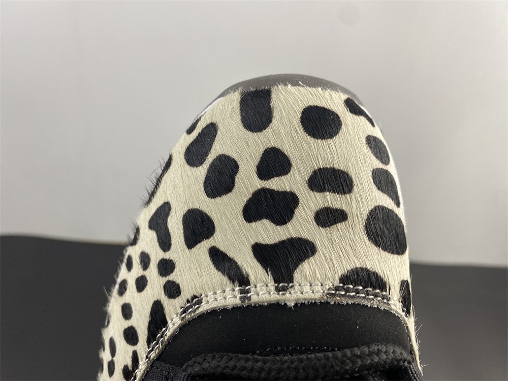 Air Jordan 11 “Animal Instinct” Black / Red / Sail / White AR0715-010