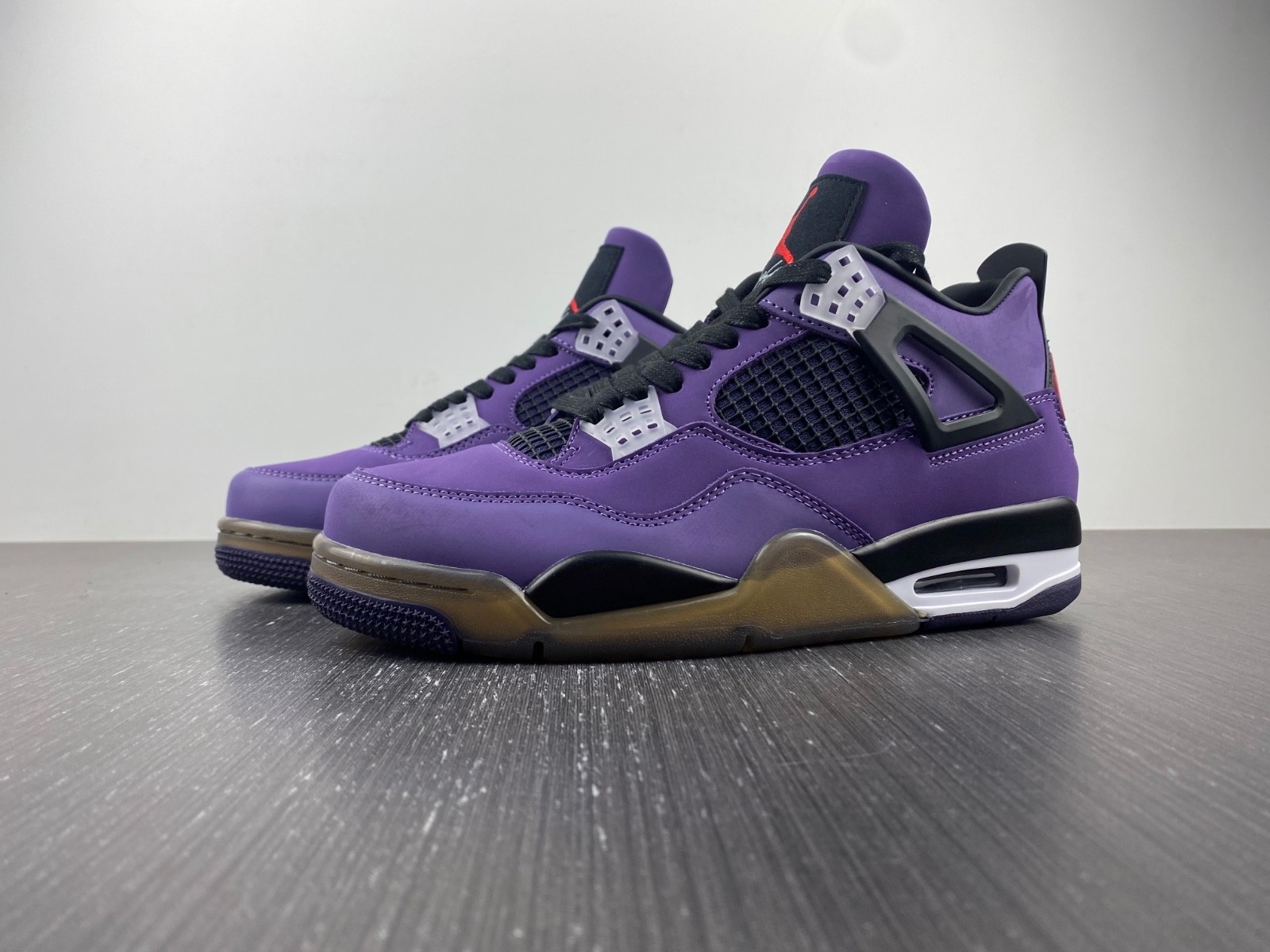 TRAVIS SCOTT X AIR JORDAN 4 IN PURPLE