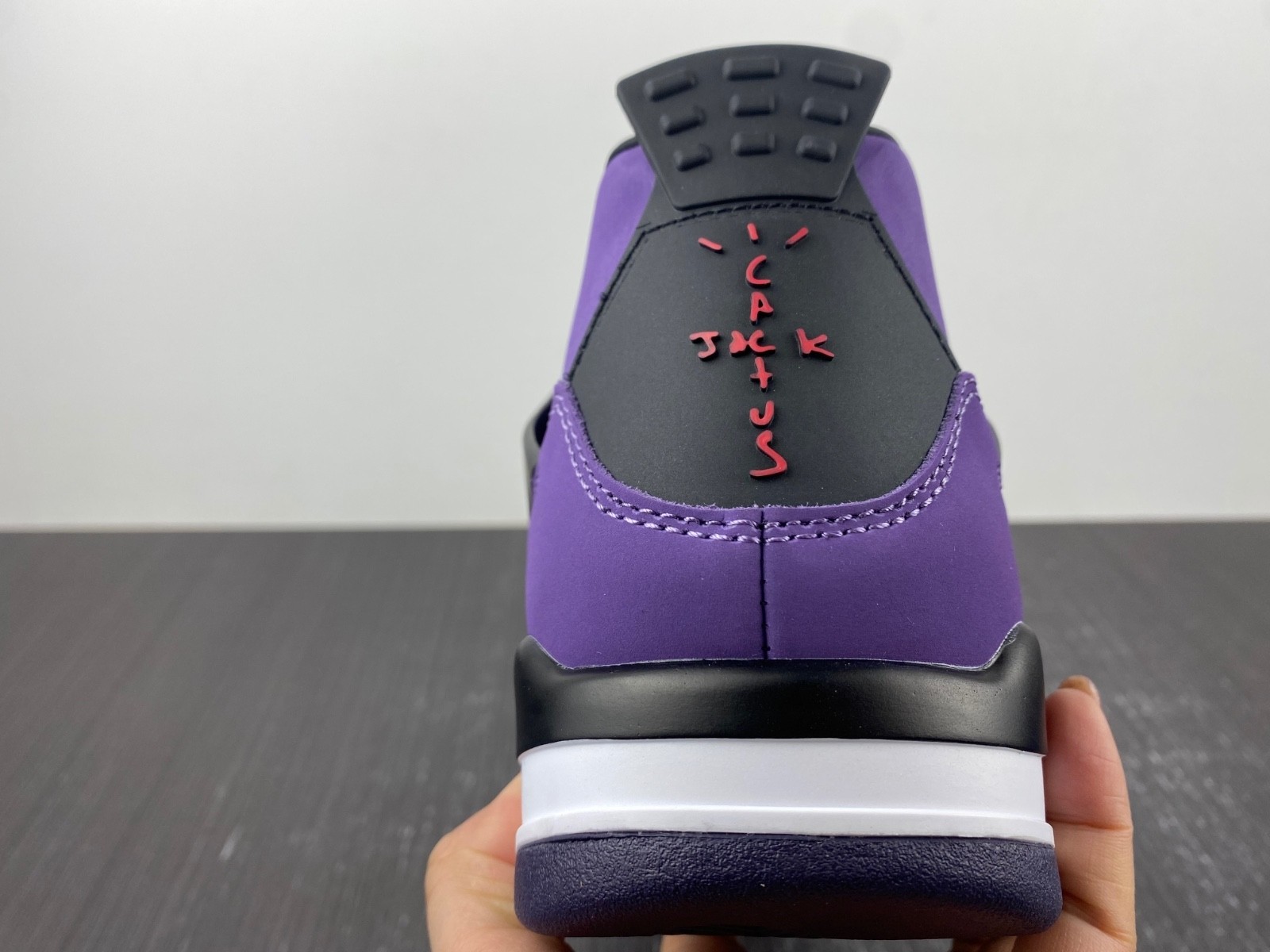 TRAVIS SCOTT X AIR JORDAN 4 IN PURPLE