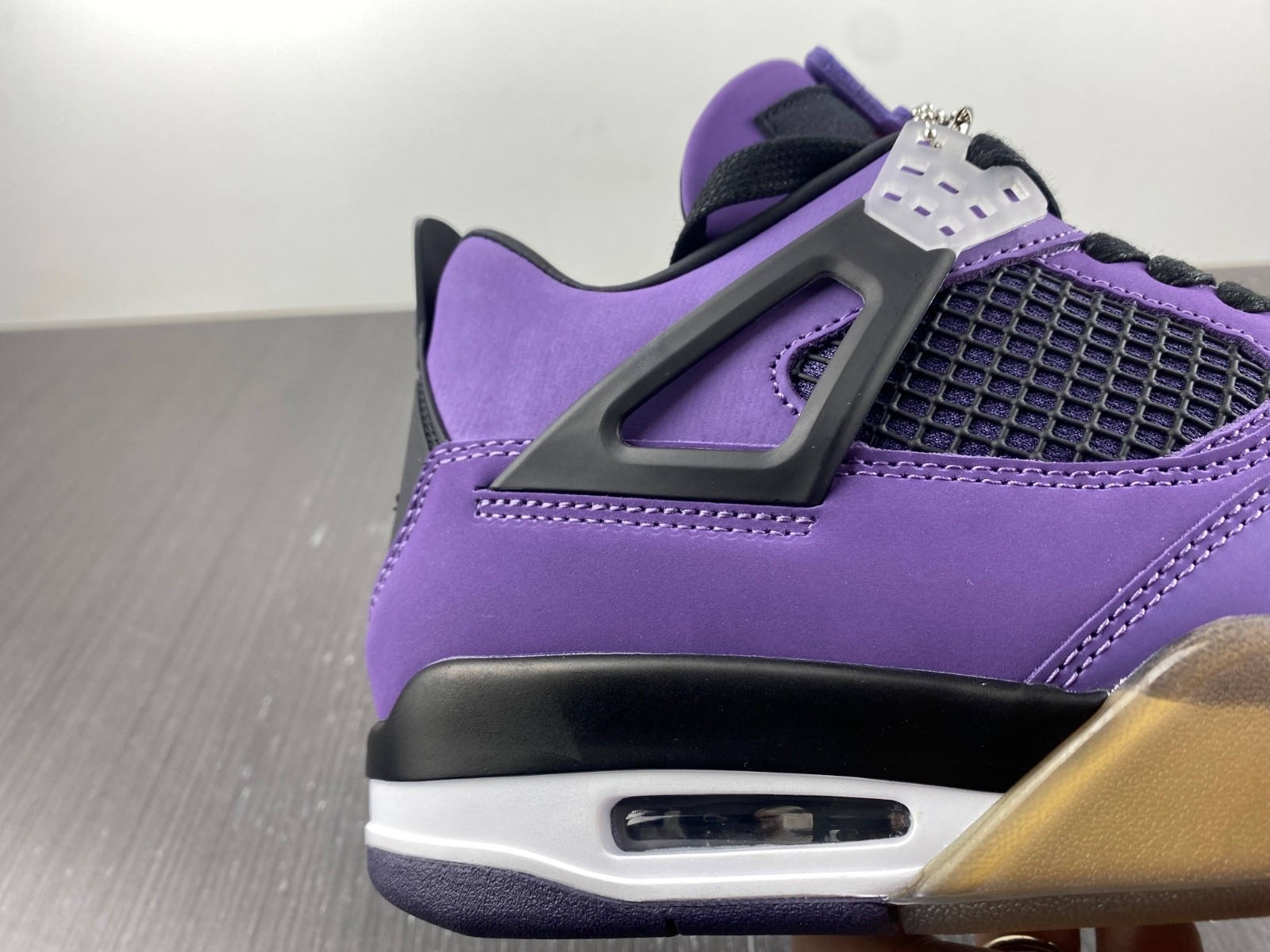 TRAVIS SCOTT X AIR JORDAN 4 IN PURPLE