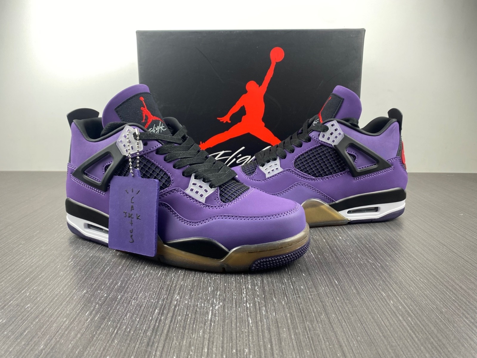 TRAVIS SCOTT X AIR JORDAN 4 IN PURPLE