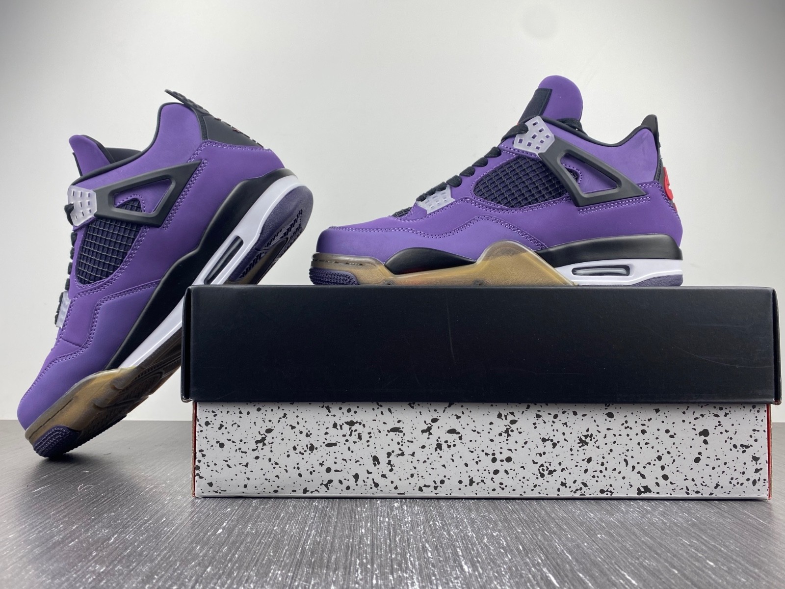 TRAVIS SCOTT X AIR JORDAN 4 IN PURPLE