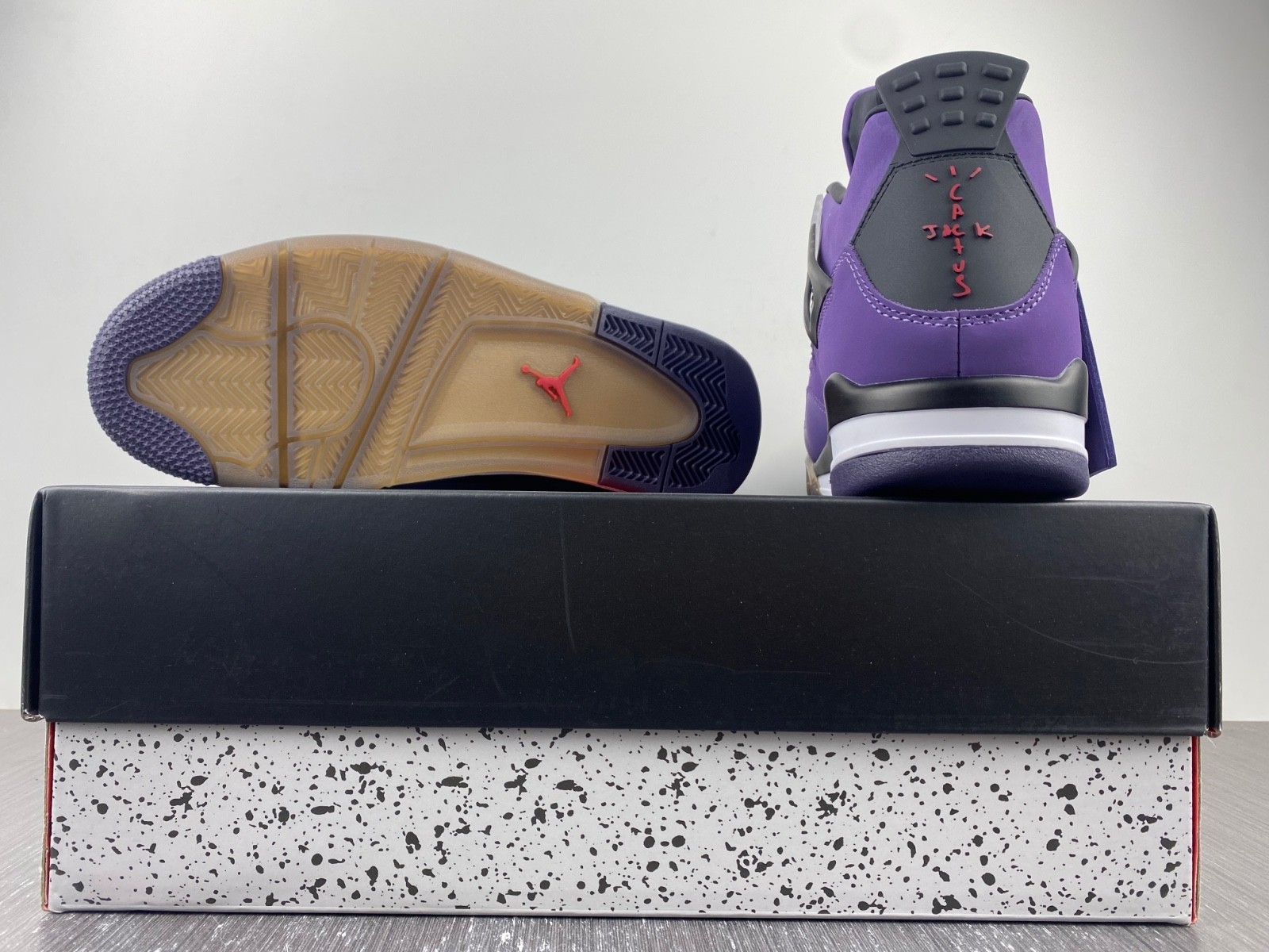 TRAVIS SCOTT X AIR JORDAN 4 IN PURPLE